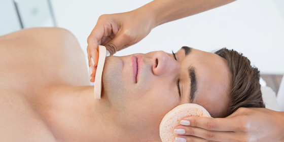 Men's facial treatment at EXHALE SPA Toronto Airport